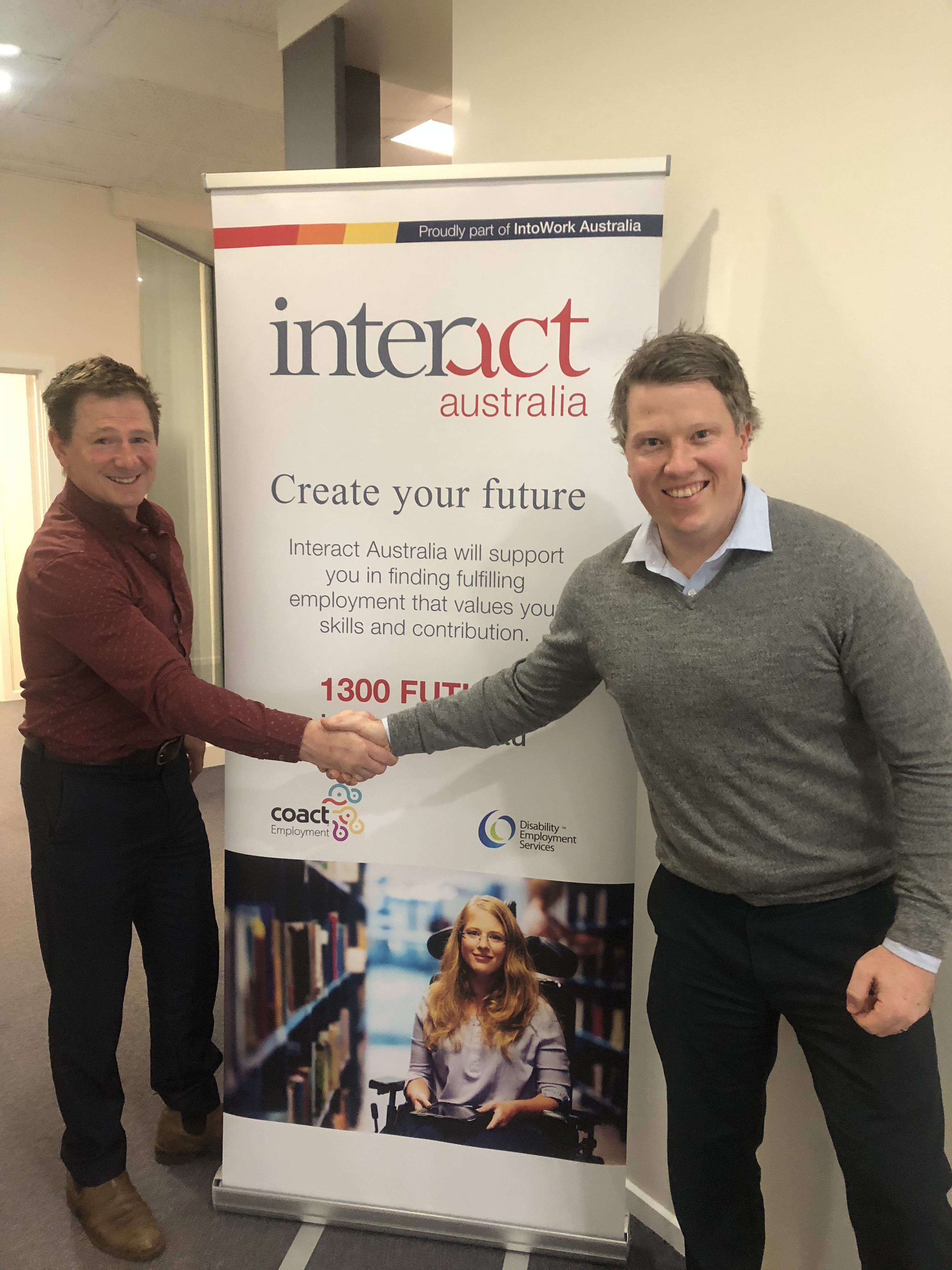 Matthew Dance, Employer Services Manager At Workskil, And Darryn Perry, Performance & Partnership Leader At Interact Australia, Pictured Shaking Hands To Celebrate Their Partnership Agreement Between Both Organisations.